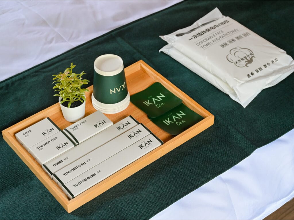 Essential glamping toiletries and branded amenities from IKAN Glampsite arranged on a tray